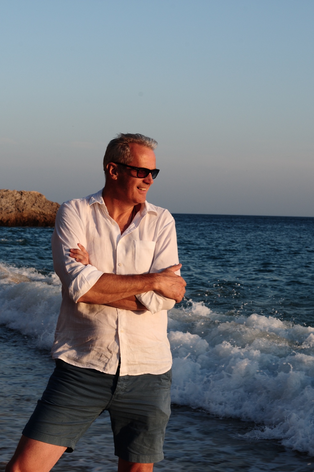 Mark Elliot standing beside the sea
